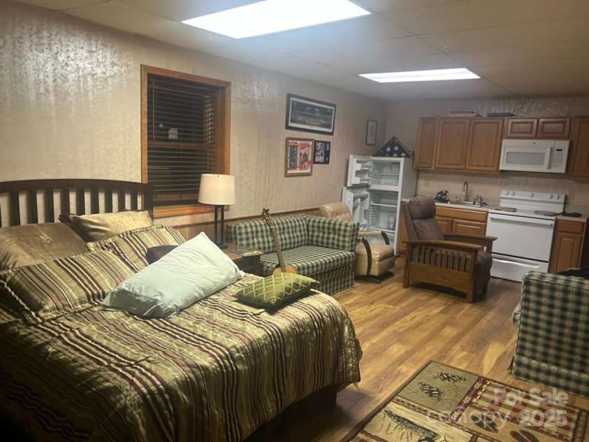 825 Posey Blanton Road, Sylva, NC 28779.  MLS# CAR4237679, YatesRealty ID 6159. 