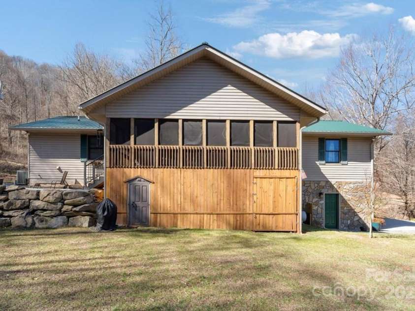 825 Posey Blanton Road, Sylva, NC 28779.  MLS# CAR4237679, YatesRealty ID 6159. 