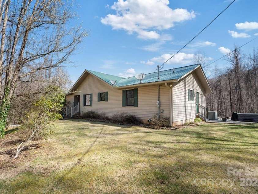 825 Posey Blanton Road, Sylva, NC 28779.  MLS# CAR4237679, YatesRealty ID 6159. 