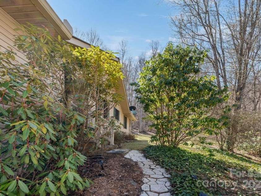 825 Posey Blanton Road, Sylva, NC 28779.  MLS# CAR4237679, YatesRealty ID 6159. 