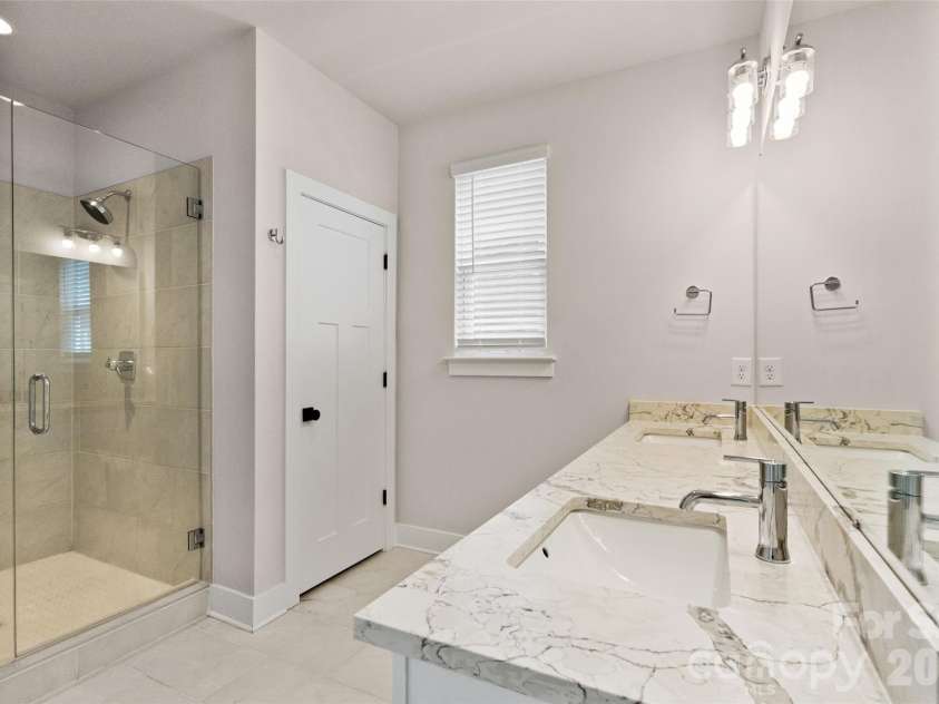6017 Irwins Branch Drive, Charlotte, NC 28217.  MLS# CAR4349168, YatesRealty ID 6164. Primary bathroom