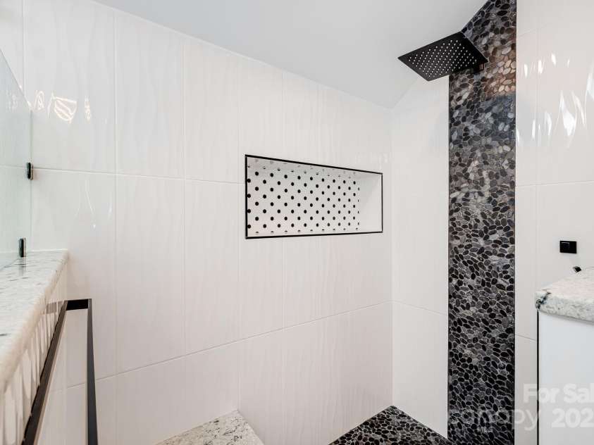 1387 Woods Ammons Road, Mars Hill, NC 28754.  MLS# CAR4303363, YatesRealty ID 6175. Custom marble and stone shower