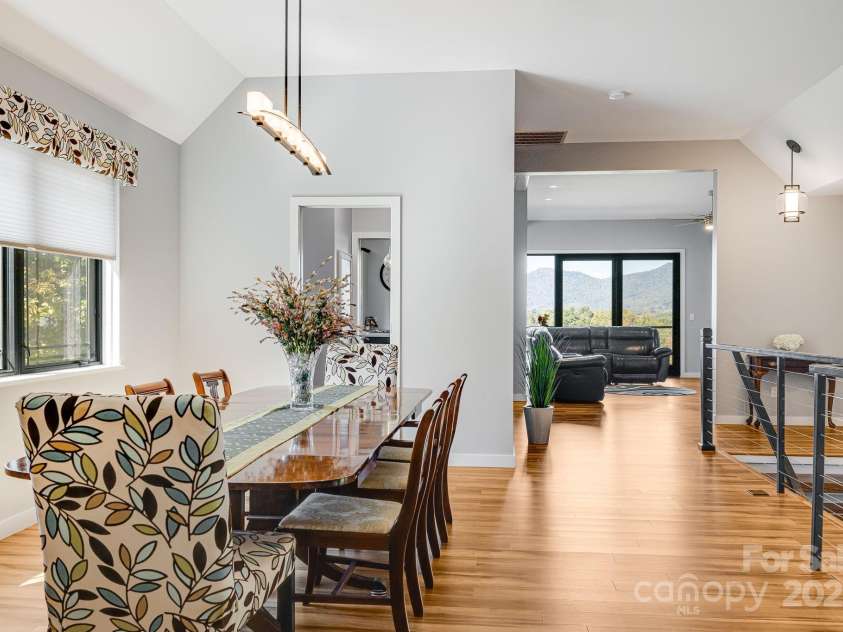 1387 Woods Ammons Road, Mars Hill, NC 28754.  MLS# CAR4303363, YatesRealty ID 6175. Dining area, table for sale, family antique