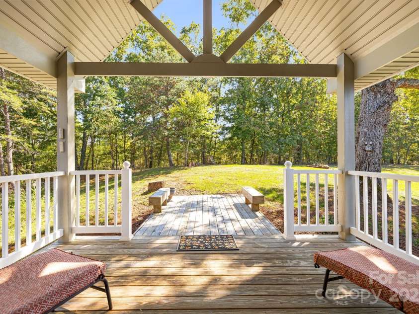 1387 Woods Ammons Road, Mars Hill, NC 28754.  MLS# CAR4303363, YatesRealty ID 6175. Extra-large primary wall in closet - Hidden safe behind mirror