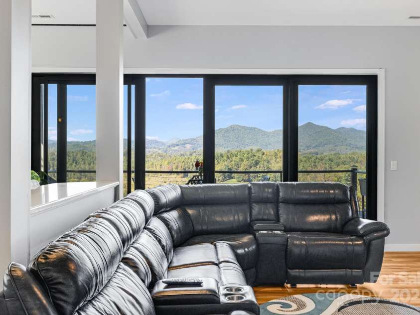 1387 Woods Ammons Road, Mars Hill, NC 28754.  MLS# CAR4303363, YatesRealty ID 6175. Family Room views - Couch negotiable