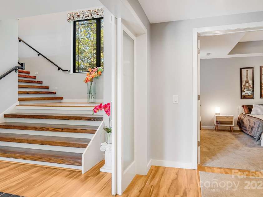 1387 Woods Ammons Road, Mars Hill, NC 28754.  MLS# CAR4303363, YatesRealty ID 6175. Foyer and Lower bedroom entrance