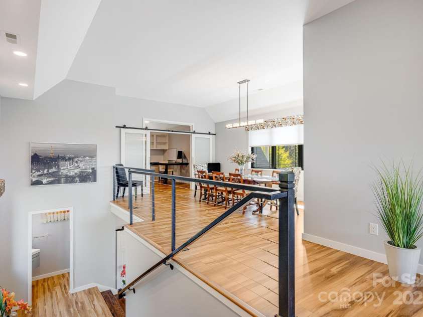 1387 Woods Ammons Road, Mars Hill, NC 28754.  MLS# CAR4303363, YatesRealty ID 6175. Top of stairs to Upper Level and Dining area