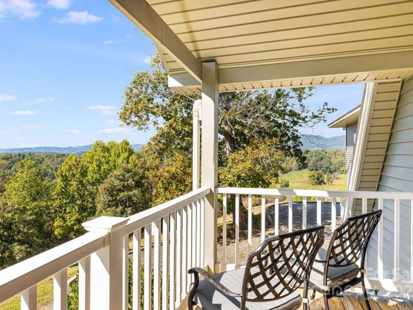 1387 Woods Ammons Road, Mars Hill, NC 28754.  MLS# CAR4303363, YatesRealty ID 6175. West facing deck views