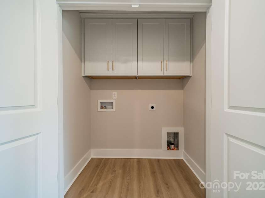574 Reid Street, Belmont, NC 28012.  MLS# CAR4228442, YatesRealty ID 6181. Upstairs Laundry Room