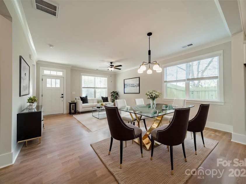 574 Reid Street, Belmont, NC 28012.  MLS# CAR4228442, YatesRealty ID 6181. Virtually staged dining & living room