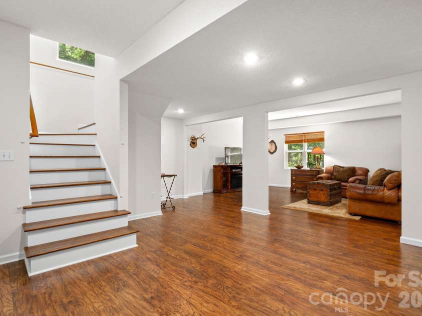 701 Salisbury Road, Hendersonville, NC 28792.  MLS# CAR4279569, YatesRealty ID 6181. Lower Level!