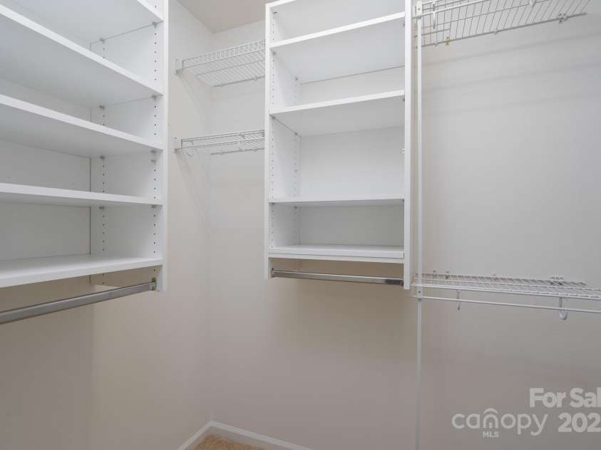 6111 Tesh Court, Charlotte, NC 28269.  MLS# CAR4239195, YatesRealty ID 6183. Owner's Suite Walk In Closet