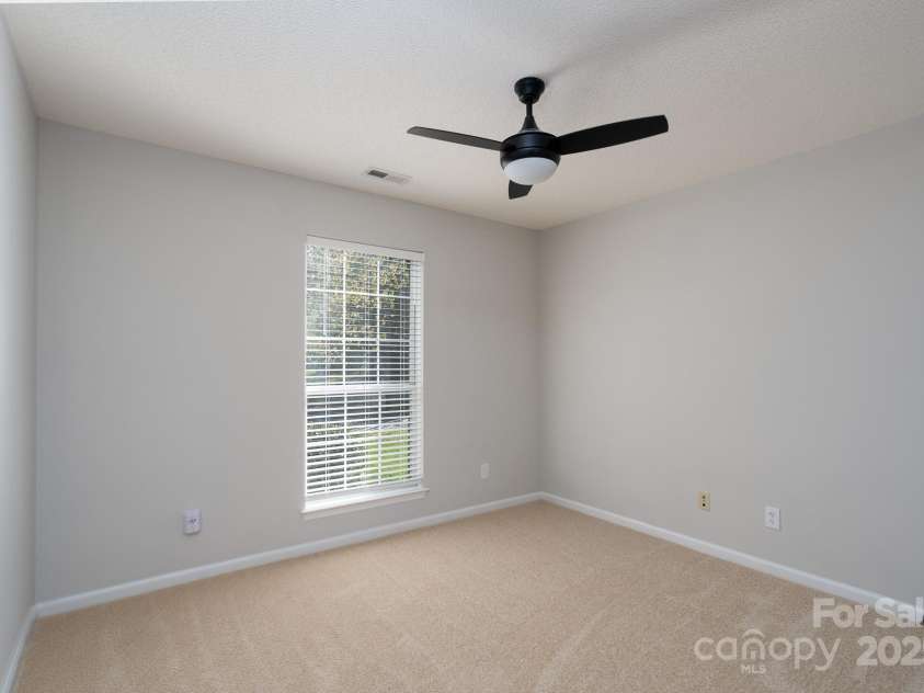 6111 Tesh Court, Charlotte, NC 28269.  MLS# CAR4239195, YatesRealty ID 6183. Secondary bedroom #1 off entry hall