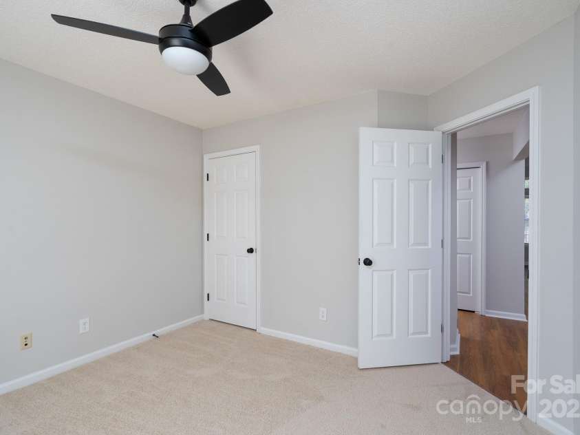 6111 Tesh Court, Charlotte, NC 28269.  MLS# CAR4239195, YatesRealty ID 6183. Secondary Bedroom #1 off entry hall