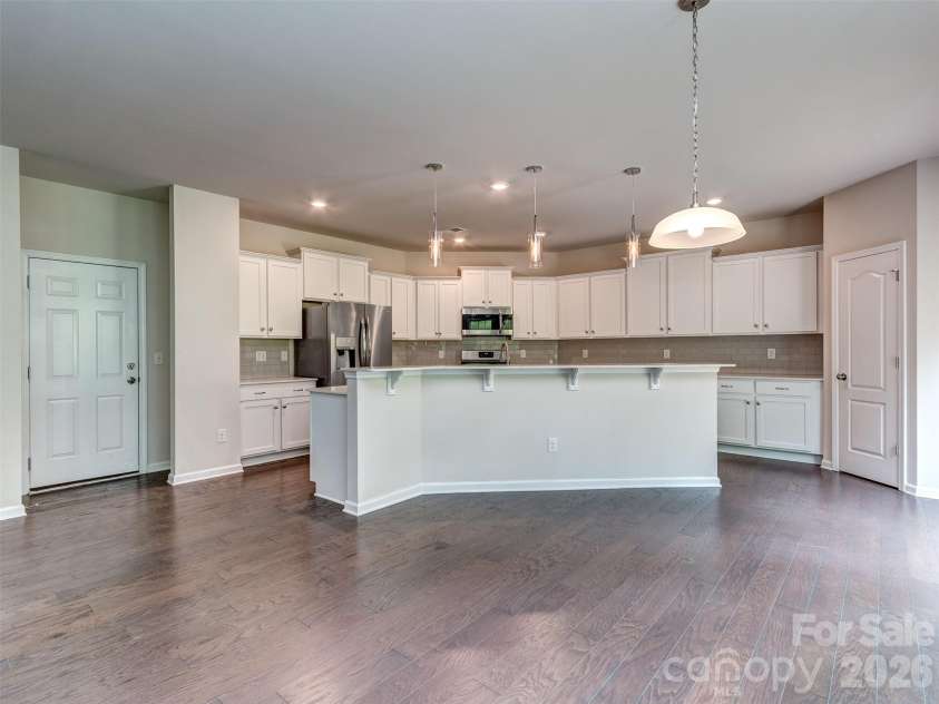 2118 Killian Creek Drive, Denver, NC 28037.  MLS# CAR4358493, YatesRealty ID 6184. Oversize island 