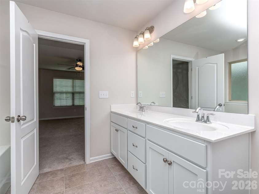 2118 Killian Creek Drive, Denver, NC 28037.  MLS# CAR4358493, YatesRealty ID 6184. Primary bathroom