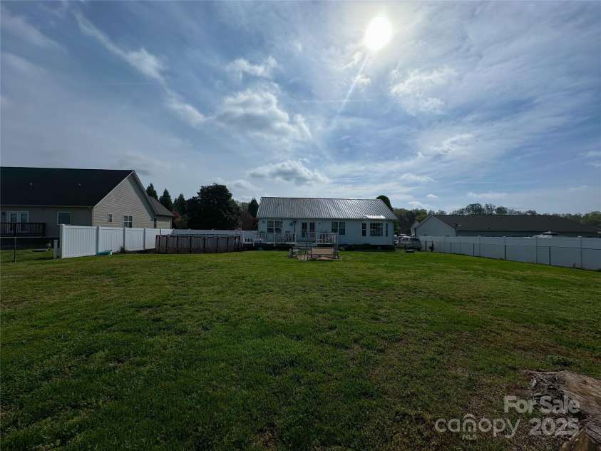 108 Windrow Lane, Statesville, NC 28625.  MLS# CAR4238628, YatesRealty ID 6189. Huge fully fenced back yard