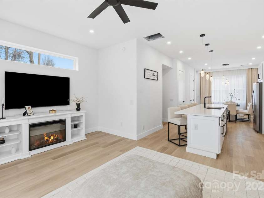 45 Richland Street, Waynesville, NC 28786.  MLS# CAR4331469, YatesRealty ID 619. Living room and kitchen