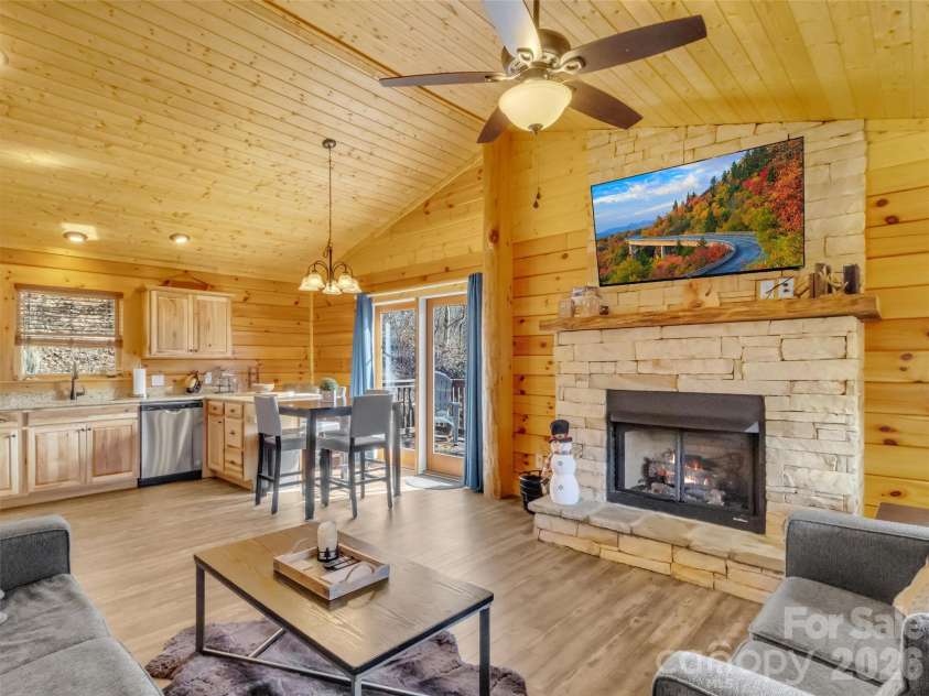 24 Hawthorn Road, Maggie Valley, NC 28751.  MLS# CAR4342542, YatesRealty ID 6190. Custom gas fireplace