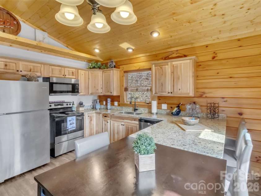 24 Hawthorn Road, Maggie Valley, NC 28751.  MLS# CAR4342542, YatesRealty ID 6190. Fully equipped kitchen