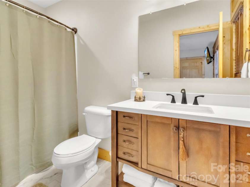 24 Hawthorn Road, Maggie Valley, NC 28751.  MLS# CAR4342542, YatesRealty ID 6190. Primary bath