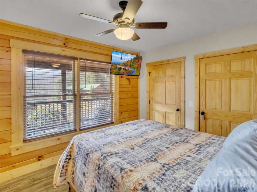 24 Hawthorn Road, Maggie Valley, NC 28751.  MLS# CAR4342542, YatesRealty ID 6190. Primary bedroom 