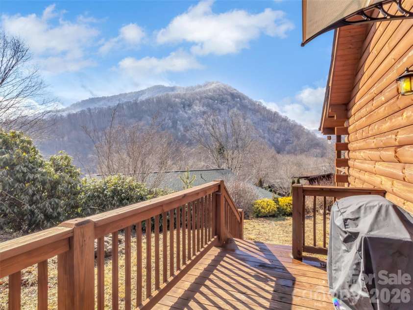 24 Hawthorn Road, Maggie Valley, NC 28751.  MLS# CAR4342542, YatesRealty ID 6190. Side deck with breathtaking views