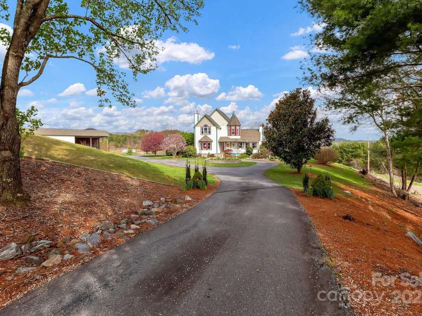 122 Windy Hills Lane, Leicester, NC 28748.  MLS# CAR4240865, YatesRealty ID 6195. Drive to home