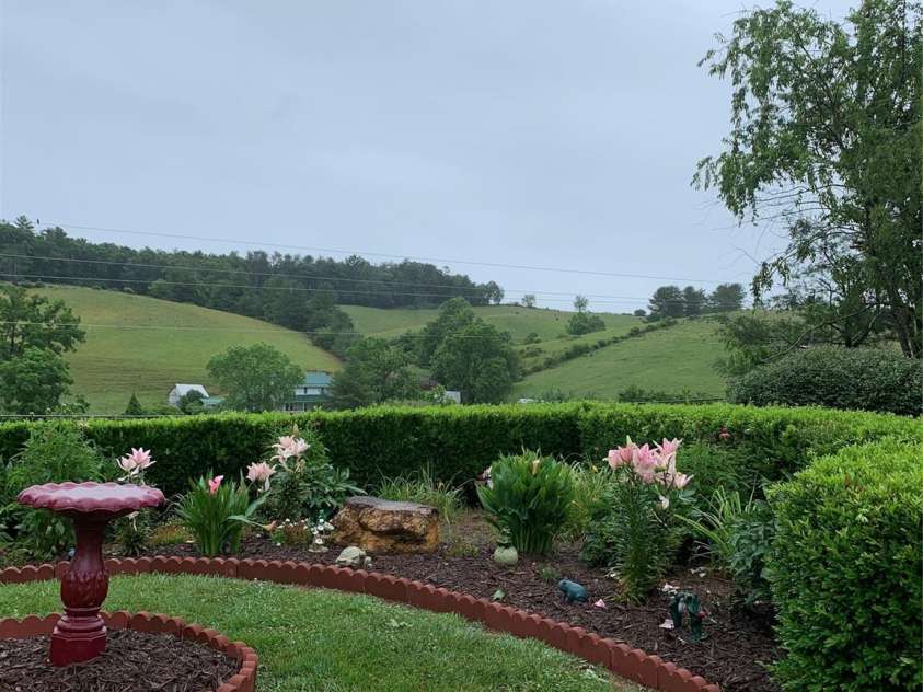 122 Windy Hills Lane, Leicester, NC 28748.  MLS# CAR4240865, YatesRealty ID 6195. Gardens