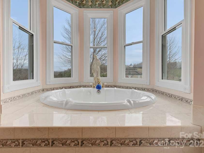 122 Windy Hills Lane, Leicester, NC 28748.  MLS# CAR4240865, YatesRealty ID 6195. Primary Bath