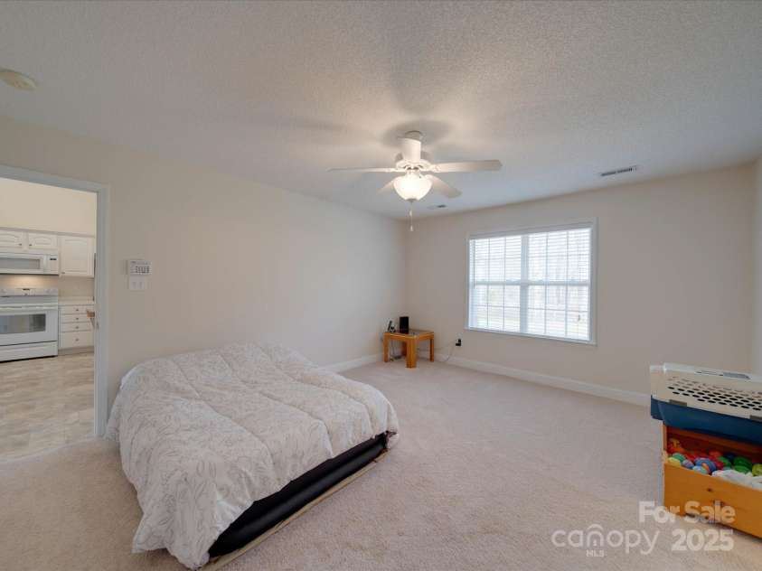 8353 Emily Drive, Harrisburg, NC 28075.  MLS# CAR4225347, YatesRealty ID 6198. Primary BedroomPrimary Bedroom