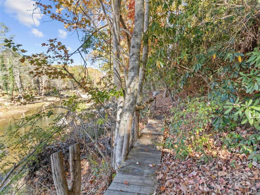 996 Halls Chapel Road, Burnsville, NC 28714.  MLS# CAR4314014, YatesRealty ID 620. Bridge going to shed