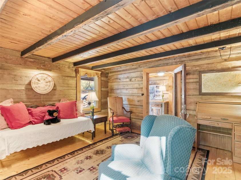 996 Halls Chapel Road, Burnsville, NC 28714.  MLS# CAR4314014, YatesRealty ID 620. Living room to foyer