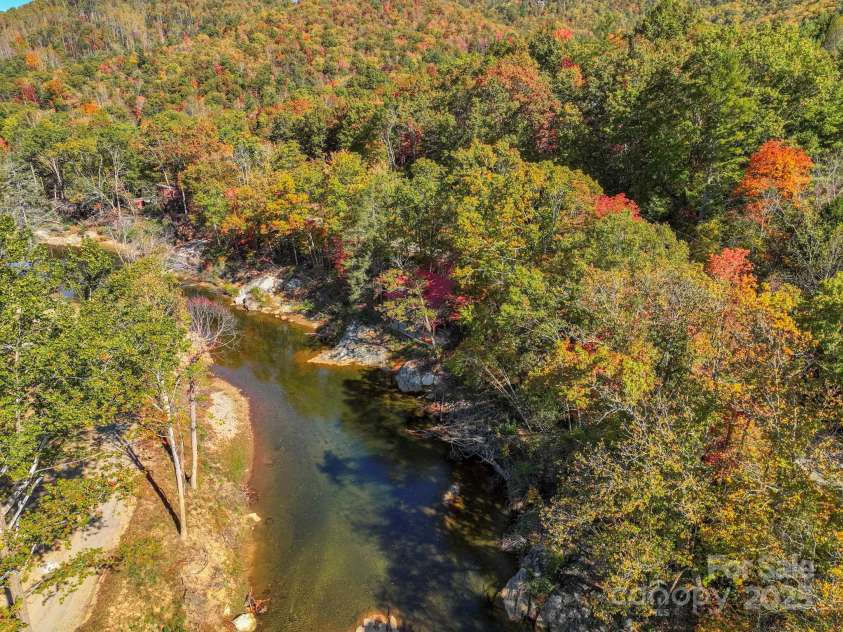 996 Halls Chapel Road, Burnsville, NC 28714.  MLS# CAR4314014, YatesRealty ID 620. Up river drone shot