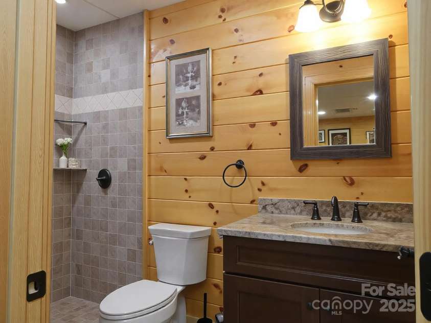 214 Whitney Boulevard, Lake Lure, NC 28746.  MLS# CAR4231828, YatesRealty ID 621. Lower Level Bath