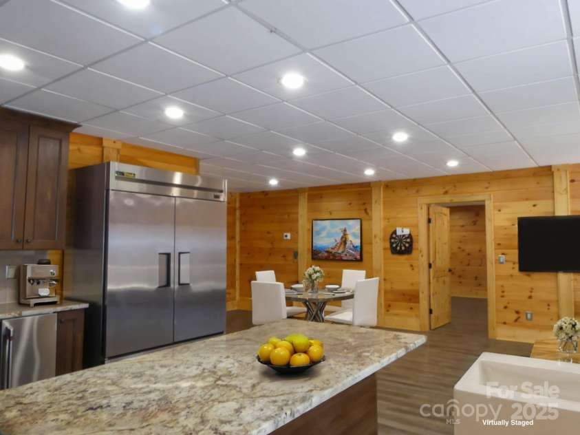 214 Whitney Boulevard, Lake Lure, NC 28746.  MLS# CAR4231828, YatesRealty ID 621. Lower Level Kitchen