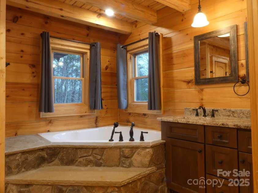 214 Whitney Boulevard, Lake Lure, NC 28746.  MLS# CAR4231828, YatesRealty ID 621. Primary Bath