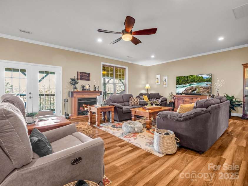 261 Boland Drive, Lake Lure, NC 28746.  MLS# CAR4232429, YatesRealty ID 6212. Living room