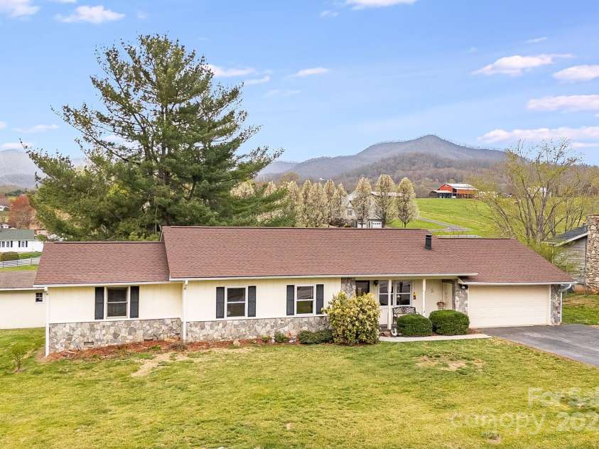 413 Morgan Road, Candler, NC 28715.  MLS# CAR4240866, YatesRealty ID 6213. 