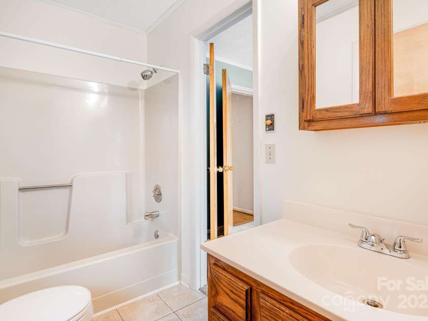 413 Morgan Road, Candler, NC 28715.  MLS# CAR4240866, YatesRealty ID 6213. 