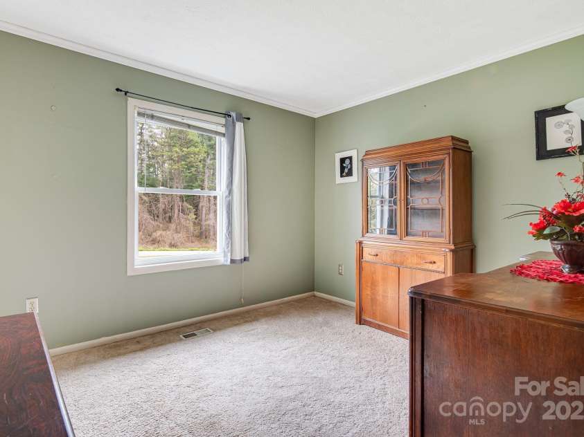 413 Morgan Road, Candler, NC 28715.  MLS# CAR4240866, YatesRealty ID 6213. 