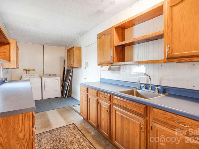 413 Morgan Road, Candler, NC 28715.  MLS# CAR4240866, YatesRealty ID 6213. 