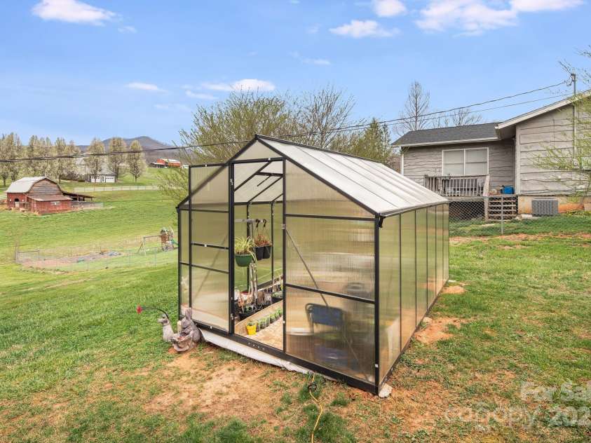 413 Morgan Road, Candler, NC 28715.  MLS# CAR4240866, YatesRealty ID 6213. 