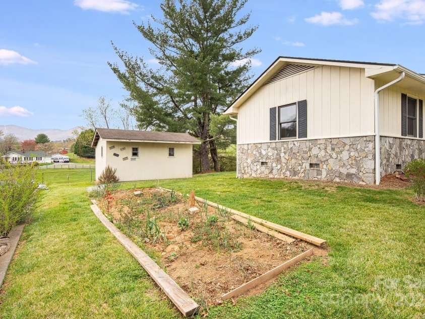 413 Morgan Road, Candler, NC 28715.  MLS# CAR4240866, YatesRealty ID 6213. 