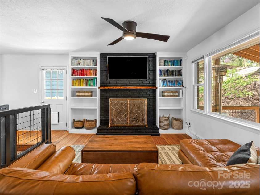 93 Morningside Drive, Asheville, NC 28806.  MLS# CAR4244401, YatesRealty ID 6214. Wood burning fireplace with built ins.