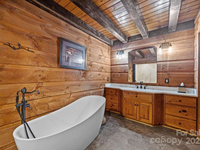 670 Barber Road, Zirconia, NC 28790.  MLS# CAR4293053, YatesRealty ID 622. Primary bath