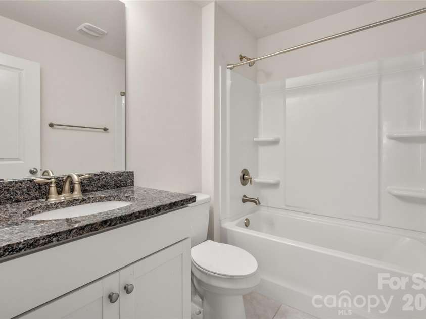 2015 Saddlebred Drive, Iron Station, NC 28080.  MLS# CAR4338671, YatesRealty ID 6220. 4th full bath : Private bath off 5th bedroom