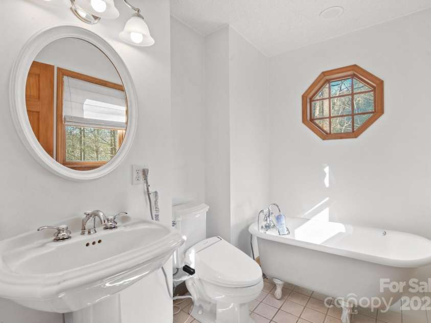 735 Holleridge Road, Ferguson, NC 28624.  MLS# CAR4212666, YatesRealty ID 6226. Primary Bath