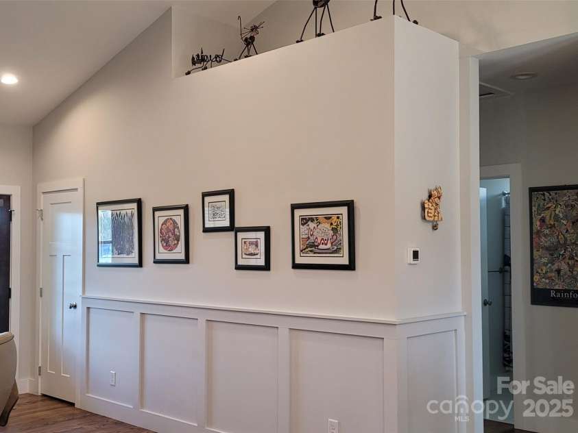 182 Country Drive, Mars Hill, NC 28754.  MLS# CAR4161699, YatesRealty ID 6228. Added wood accents on living room wall