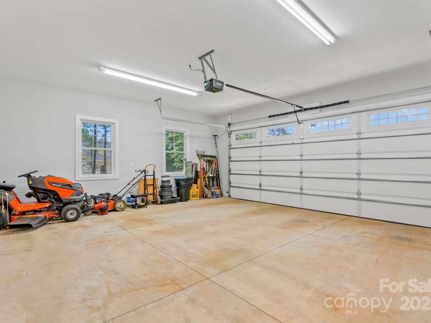 182 Country Drive, Mars Hill, NC 28754.  MLS# CAR4161699, YatesRealty ID 6228. Full size two car garage